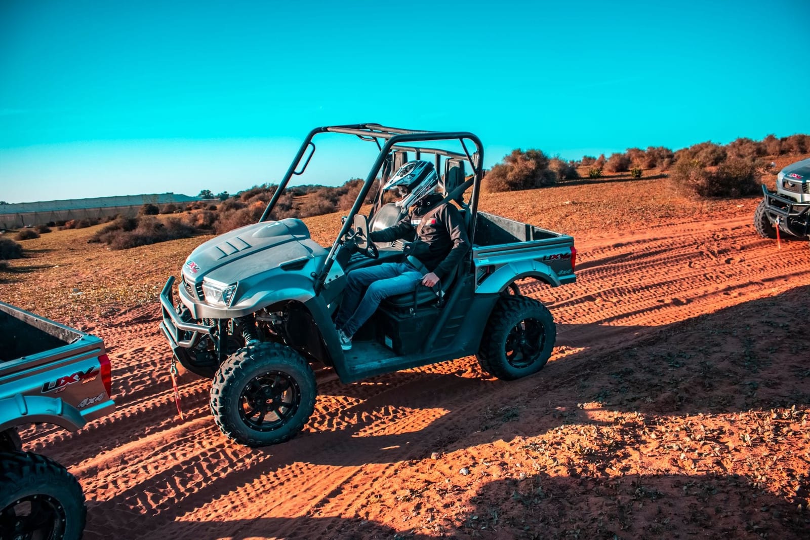 An off-road 4x4 driving through the Moroccan desert