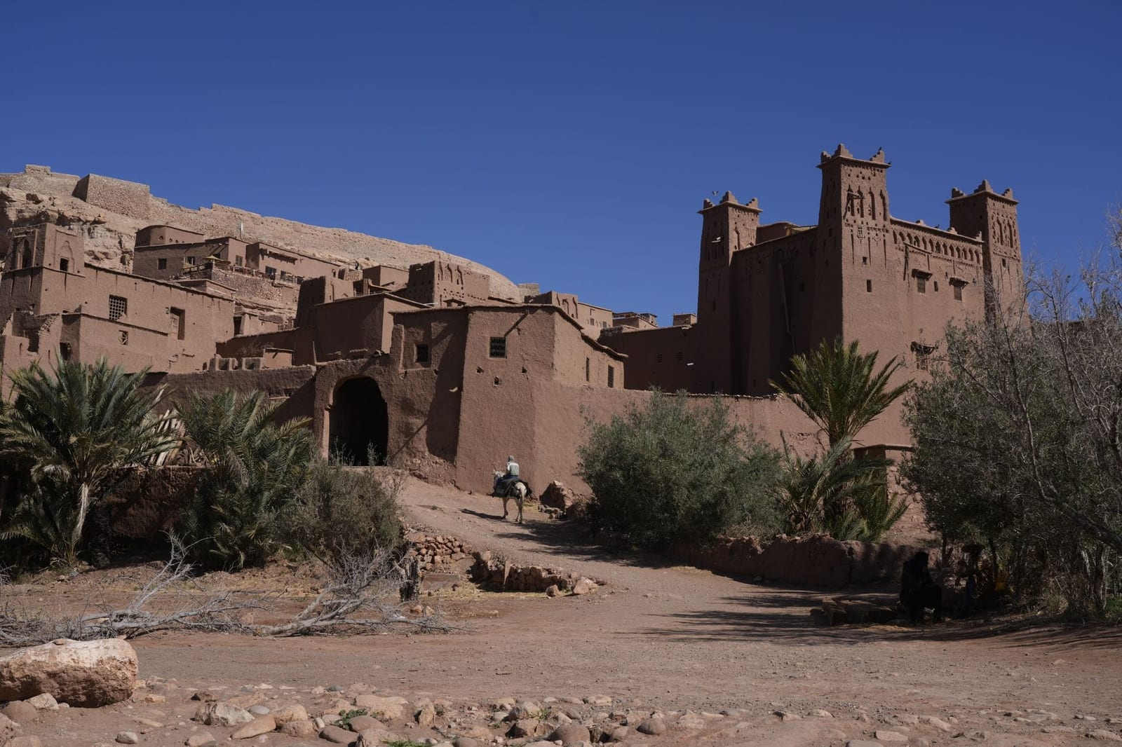 Traditional kasbah architecture in Ouarzazate under a clear sky